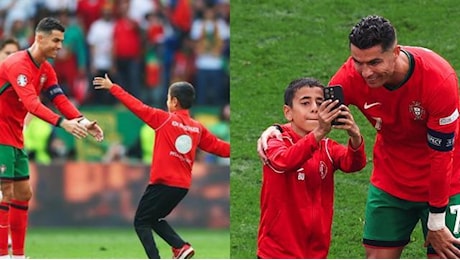 Euro 2024, un bambino invade il campo per un selfie con Ronaldo, poi fugge via dagli steward che lo inseguono