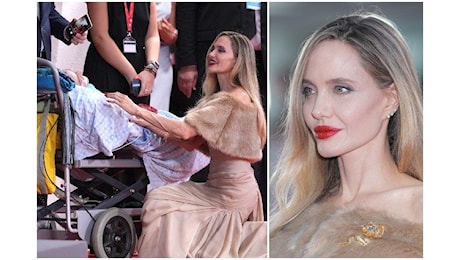 Angelina Jolie sul red carpet a Venezia saluta un fan disabile, lui: Era felice di vedermi